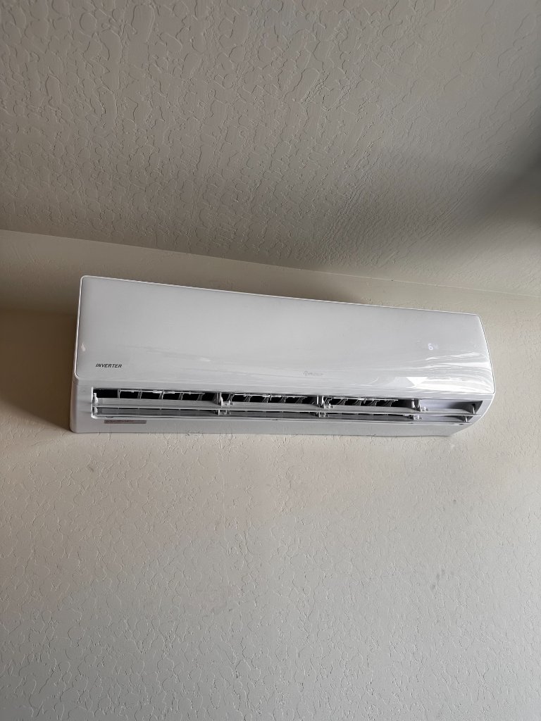 Clean professional mini split wall unit installation Southern Utah home