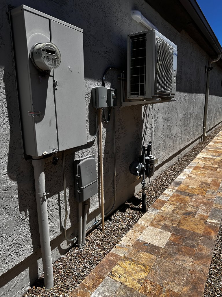 New Aurus mini split outdoor condenser installation on concrete pad Southern Utah