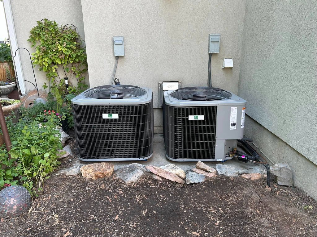 Newly installed central HVAC condenser units at Phoenix home